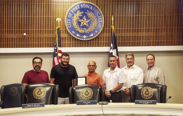 City officials gathered to celebrate the service of Paul Jerome Chavez on Monday. Chavez isn’t going far though, as he is now serving his Pct as a Pecos County Commissioner. Pictured here is Councilman Ruben Falcon, Councilman Ruben J. Bernal, Chavez, Mayor Paul Casias, City Manager Frank Rodriguez, and Councilman Darren Hodges. Photo by Joh Covington.