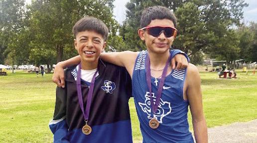 Pictured here is Angel Marquez and Octavio Ronquillo. Ronquillo ran a steady, disciplined race to secure a spot on the podium. In the varsity boys’ division, Angel Marquez continued his standout season by bringing home a medal of his own, proving once again that he can rise to the challenge on some of the toughest courses. Courtesy Photo