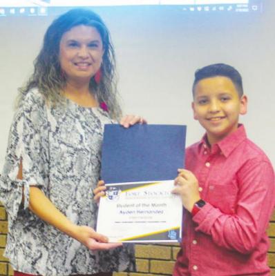Fort Stockton ISD Assistant Superintendent Amanda Urias presented the FSISD Intermediate School Student of the Month award to Ayden Hernandez at the district’s school board meeting on Feb. 16.