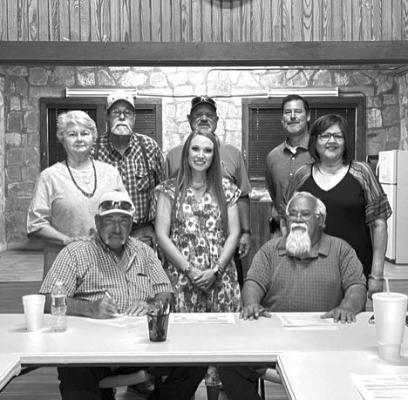 PLANNING AND FUNDING - Pictured are Dudley Mc Kissack, Board President; Billy Gonzales, General Manager. Standing are Rosalie Sullivan, Garry Edwards, Lea Daggett, board members; Kendra Burson, USDA; Andy Vecellio, Project Engineer; Sylvia Guerra, Office Manager. Courtesy Photo