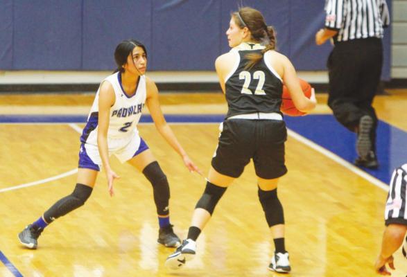 Fort Stockton junior Kianna Torres (2) defends Big Springs’ Alex Enriquez during Tuesday’s game at the Special Events Center. Photo by Nathan Heuer