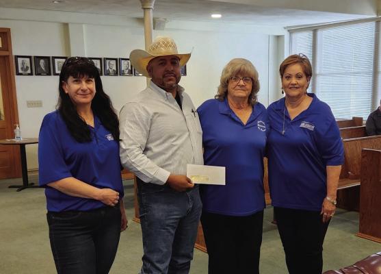The Fort Stockton Chamber of Commerce presented an award to a Precinct 1 employee, for outstanding service. Photo by Joh Covington