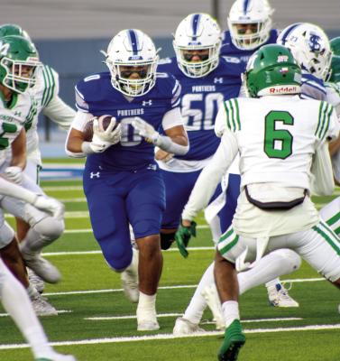 Fort Stockton running back Nick Almendarez powers up the middle for a first down during the Panthers’ 36–20 Senior Night victory over Monahans. Photo by Yovani Garay, Tumbleweed+