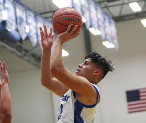 Fort Stockton junior Dominic Aguilar attempts a jump shot during the first half of Friday’s contest against Alpine on Jan. 8 at the Special Events Center. Photo by Nathan Heuer