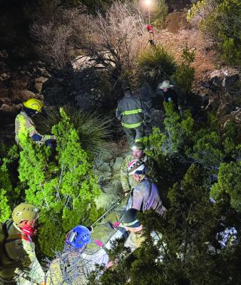 First responders from the Fort Stockton Fire Department and the Sanderson Fire Department prepare for an extraction from the remote Sorcerer’s Cave. Crews worked through the night to assist a researcher who was struck by a falling rock while ascending the cave’s steep, dramatic drops, which total a recordsetting 567 feet in depth. Courtesy Photo