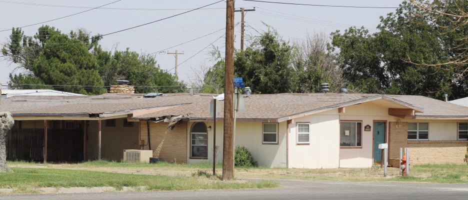 An after look at 1206 W. Sheerer shows a decluttered carport, as renovation work has kicked off. The home was on the verge of demolition but has been saved by a willing resident who is giving the property a complete makeover.