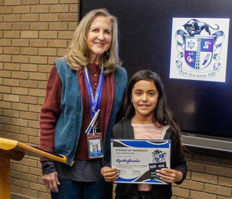 Angela Garden is the Alamo Elementary Student of the Month. Garden was received the award from Alamo Assistant Principal Cathy Havins.