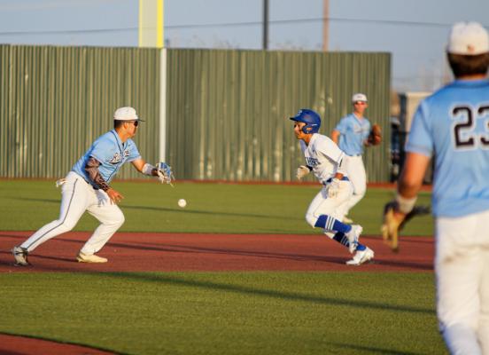 Fort Stockton junior Devon Rodriguez escapes a pickle during Tuesday’s district-opener in Fort Stockton against Greenwood. 