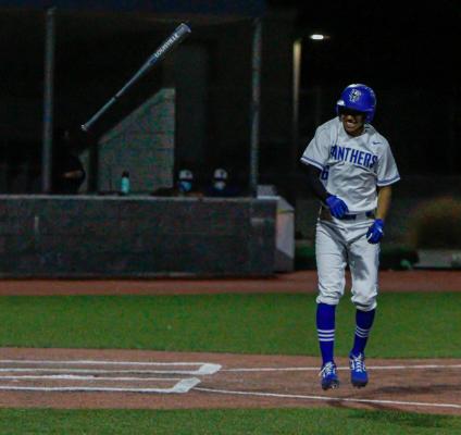 Fort Stockton’s Adrian Hernandez tosses his bat towards the Panthers bench in joy after getting a walk due to being hit by a pitch during Tuesday’s contest against Presidio. 