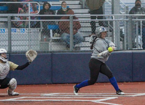 Leilani Lopez makes contact with a pitch during Tuesday’s scrimmage with Lamesa. Photo by Nathan Heuer
