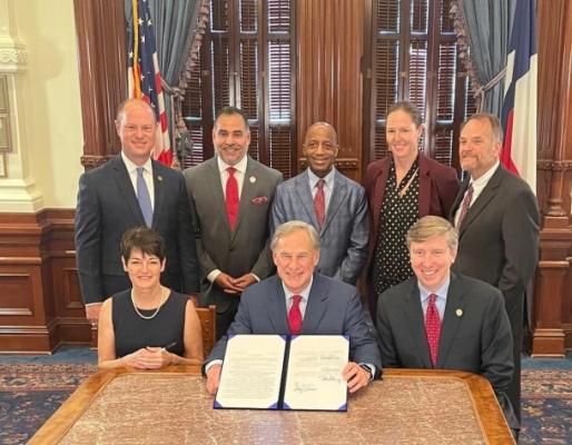 Front Row Left to Right- Senator Dr. Donna Campbell, Governor Gregg Abbott, Representative  Tan Parker Back Row – Representatives John Cyrier, Eddie Morales, James White, DRC  Executive Director Julie Lewey, and Representative Steve Toth
