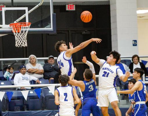 Fort Stockton’s Ethan Acosta (24) rejects a shot attempt from Presidio’s Rene Ramos (3) during Thursday’s game at the West Texas Shootout in Fort Stockton. Photos by Nathan Heuer
