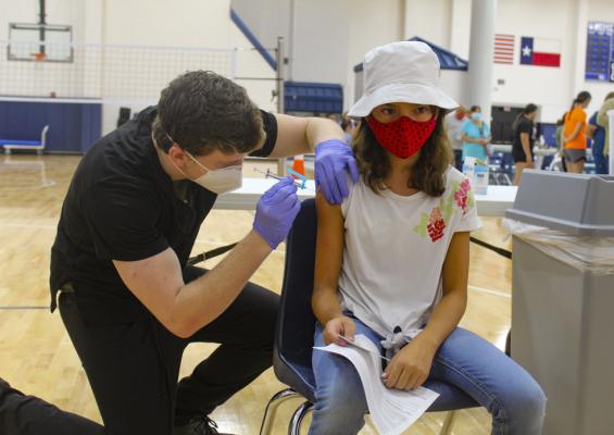 Fort Stockton 12-year-old student Gisele Caballero received a Pfizer vaccine on Tuesday at the FSISD vaccine clinic. 