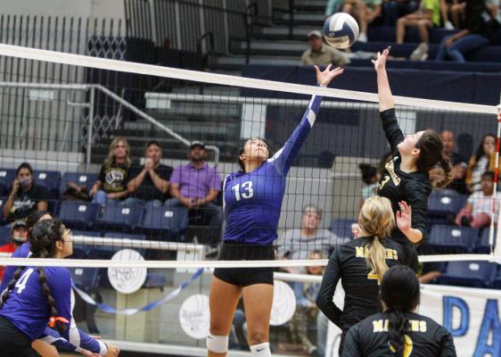 Fort Stockton senior Alyana Dominguez jousts against Seminole’s Audrianna Garcia during Tuesday’s match at home for the Prowlers. Dominguez led her team in kills and blocks in the match. 