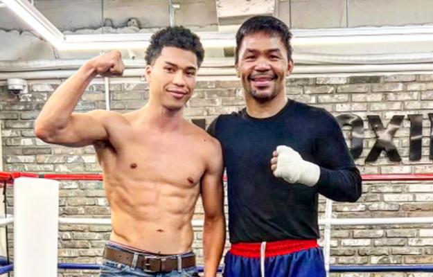Abel Mendoza, left, is pictured with Manny Pacquiao before the Triller produced event in South Korea on Dec. 10. Mendoza hopes Pacquiao will be his next opponent in his quest for a world title. Courtesy Photo