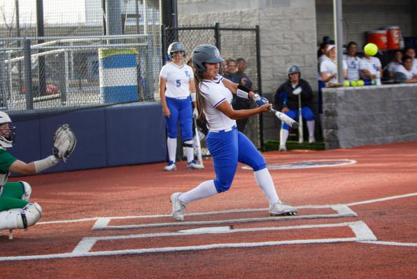 Fort Stockton’s Yadira Hernandez crushes a home run in the fifth inning on April 6 in a district home game against Monahans. 
