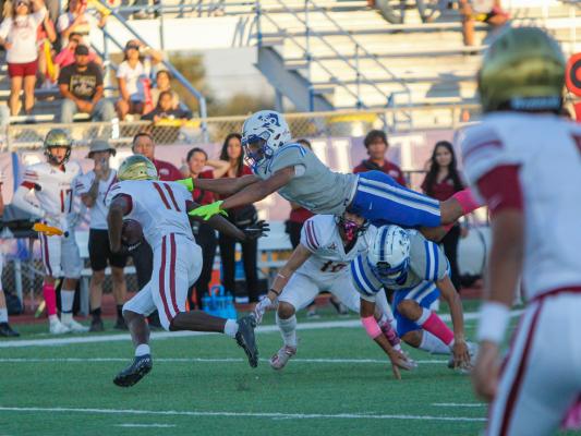 Fort Stockton defensive back Isaiah Garcia (11) dives for a tackle in the first quarter against El Dorado in the Panthers homecoming contest. 