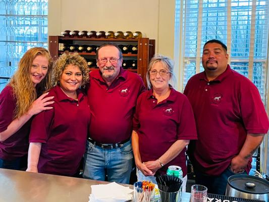 The Grey Mule Wine Saloon staff from left to right: Jessica Farmer, Monica Marrujo, Michel Duforat, Sue Wissmiller and Adrian Escajeda. Photo by Jeremy Gonzalez