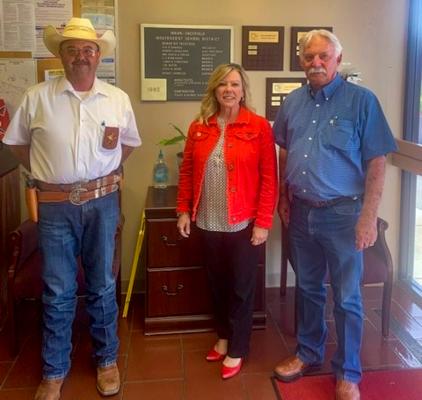 Iraan-Sheffield Superintendent Dr. Tracy Carter was in support of her school district having an SRO this upcoming school year. From left to right: Pecos County Sheriff TJ Perkins, Dr. Canter, Pecos County Judge Joe Shuster. Courtesy Photo