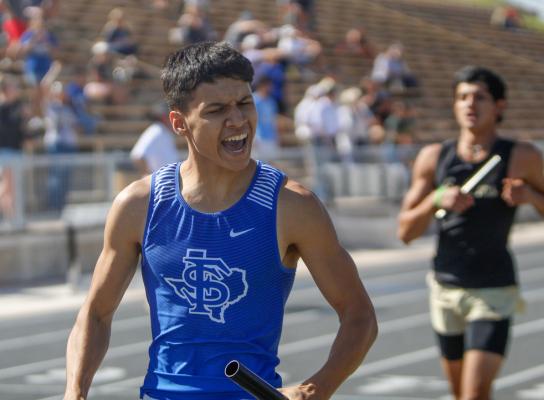 Fort Stockton 1,600 relay anchor Jesus Hernandez celebrates after he secured his team an area championship with a first-place finish in the final event of the meet. Hernandez held off Andrews’ anchor in a down-to-the-wire finish. Photo by Nathan Heuer