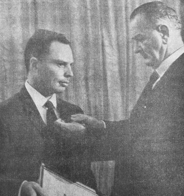 Aug. 1965 issue: CITATION – Oran W. Nicks, left, son of Mr. and Mrs. O.M. Nicks of Fort Stockton, was presented the NASA leadership medal by President Johnon in ceremonies at the White House last week. Nicks was one of three space officials honored for their parts in the recent Mariner space probe which transmitted televised pictures of Mars.