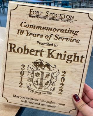 Robert Knight’s plaque for 10 years of service was presented to him on Dec. 16 at the district’s Christmas party. Courtesy Photo