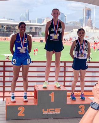 Mariana Sanchez, left, placed second in the 1,600-meter run in Class 1A.
