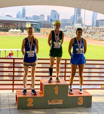 Mariana Sanchez, right, placed third in the 1,600-meter run in Class 1A.