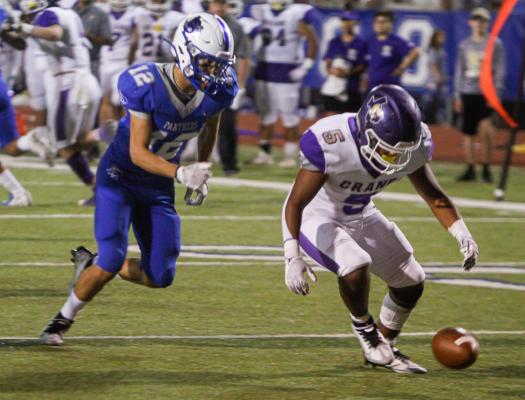 Senior Felipe Sotelo (12) had the most productive game of his Panther career on Friday at Ysleta. Sotelo tied his career-high tackle total for a single game with eight and hauled in the first interception of his career, which he returned for a touchdown. Photo by Nathan Heuer