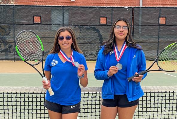 Jaslyn Pacheco and Athena Gomez pose with the silver medals they earned at the Prowlers respective district meet in Seminole on April 4. Courtesy Photo