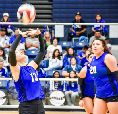 Addison Castro sets the ball for the Prowlers. File photo by Julie Myers