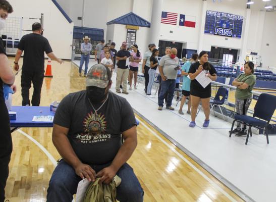 Numerous Fort Stockton students, parents, and residents stood in line for their vaccine on Tuesday morning at the high school’s Special Events Center. 