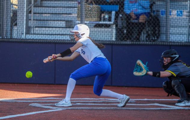 Fort Stockton junior Ivanna Ortiz lays down a sacrifice bunt in the second inning of Tuesday’s home contest against Seminole. Ortiz advanced Dmya Vaughn to second base on the play before Mia Garcia’s home run later in the frame. Photo by Nathan Heuer