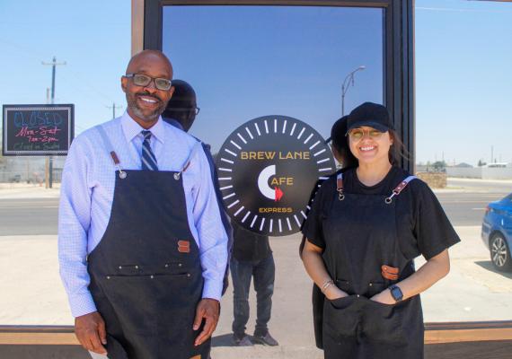 Brew Lane Café Express co-owners Gavyn Thomas, left, and Leslie Rodriguez, right, are pictured outside their new business on Dickinson Boulevard on June 10. Photo by Nathan Heuer