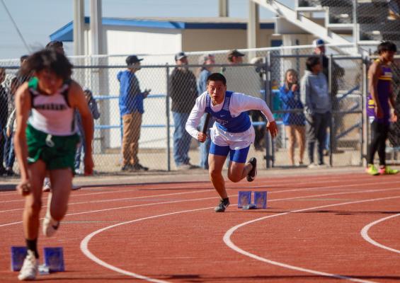 Senior Miguel Trejo darts out of the blocks as the first leg of the Panthers 800 relay team at the Comanche Relays in Fort Stockton on February 26. Photo by Nathan Heuer