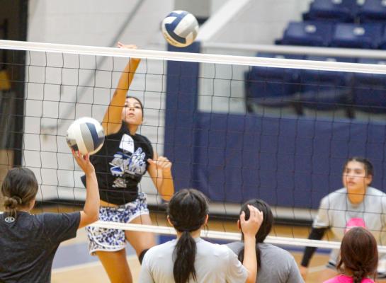 Amaya Urias goes up a kill during the first day of tryouts on Aug. 1 at the Special Events Center.