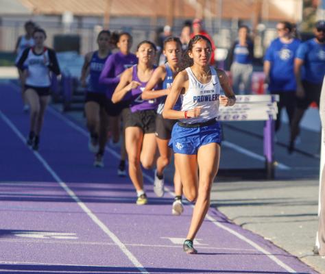 Fort Stockton’s Ali Jackson paces the pack in the 800-meter run during the West of the Pecos Relays on March 3. Photo by Nathan Heuer