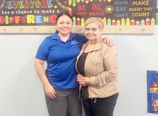 Pictured, Georgieana Carreon and her mother, and founder of Tiny Tot Learning Center, Elida Fabella. Photo by Joh Covington