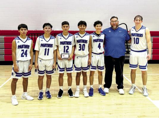 JV Basketball team post-game. Photographed left to right: Michael Bessera, Michael Jon Patino, Robbie Melendez, Jeremiah Gonzales, Conrado Palacious, and Sawyer Downing. Courtesy Photo
