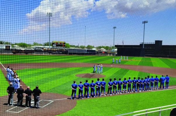 The Panthers honor the flag during the National Anthem at the playoff game in Seminole. Photo Courtesy of Fort Stockton Athletics