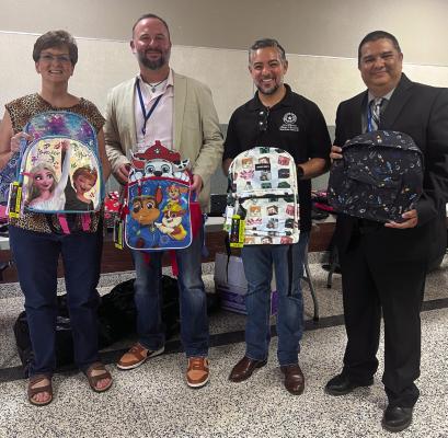 Senator Cesar Blanco, and staff and administration from the Fort Stockton Independent School District and Apache Elementary during his 9th Annual Back-to-school backpack event at Apache Elementary School. PHOTOS BY DONNA GONZALEZ