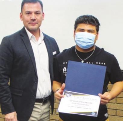 Jose Hernandez was awarded Student of the Month at the high school campus by principal Roy Alvarado. Photos by Nathan Heuer