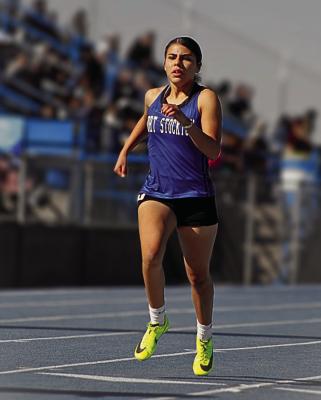 Prowler Ingrid Aguilar runs during the Comanche Relay events. Photo by Carla Vazquez
