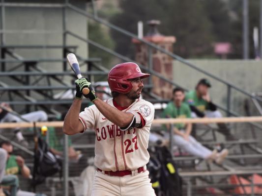 Cowboys third baseman James Prockish bats during a game against the Tucson Saguaros at Kokernot Field June 21. Prockish earned his third consecutive Pecos League All-Star selection and fourth overall by hitting .396 with 4 home runs and 32 runs batted in through July 4. Photo by Julie Myers