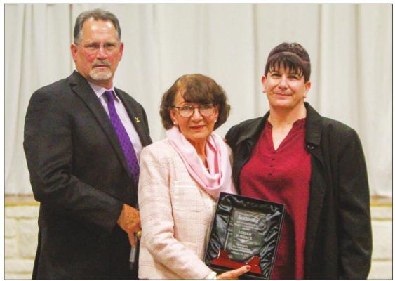 Presidential Make a Difference recipient Miriam Forgacs is pictured with Chris Alexander and Renee Gaylor.