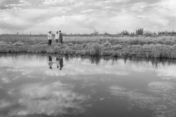 Taking Survey — Partners assist TNC staff with monitoring efforts. Photo by Jacqueline Ferrato