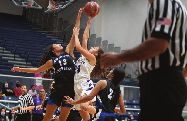 Fort Stockton junior Alyana Dominguez blocks a shot against Alpine in the Prowlers season-opener on Nov. 6. Dominguez was selected to the 2-4A All-District first team. Photo by Nathan Heuer