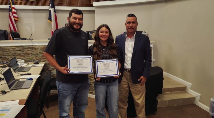 Landon Bernal was recognized as the “Alliance Fastpitch Championship Series 12U Tier II National Champion,” along with coach R.J. Bernal at this week’s city council meeting. They are pictured here with City Mayor, Paul Casias. Photo by Joh Covington