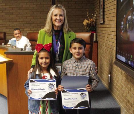 Alamo Students of the Month were Isaiah Rodirguez (November), right, and Tatiana Melendez (December). Pictured with the students is Alamo Assistant Principal Cathy Havins.