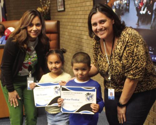 Apache Students of the month were Joshua Barboza (November) and Cali Terrazas. Pictured with the students is Apache Principal Karina Pacheco, left, and Dean of Students &amp; Campus Curriculum Director Sylvia Bernal.
